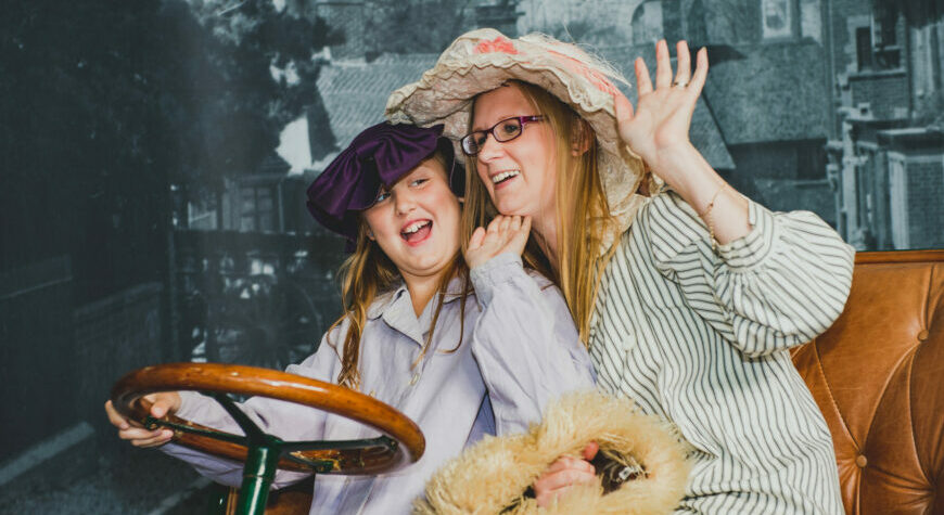 Family dressing up in the National Motor Museum