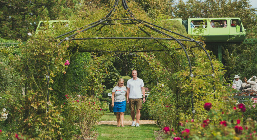 Couple walking through Beaulieu gardens